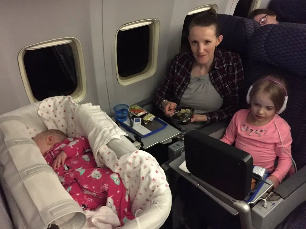 Baby in Bassinet on plane